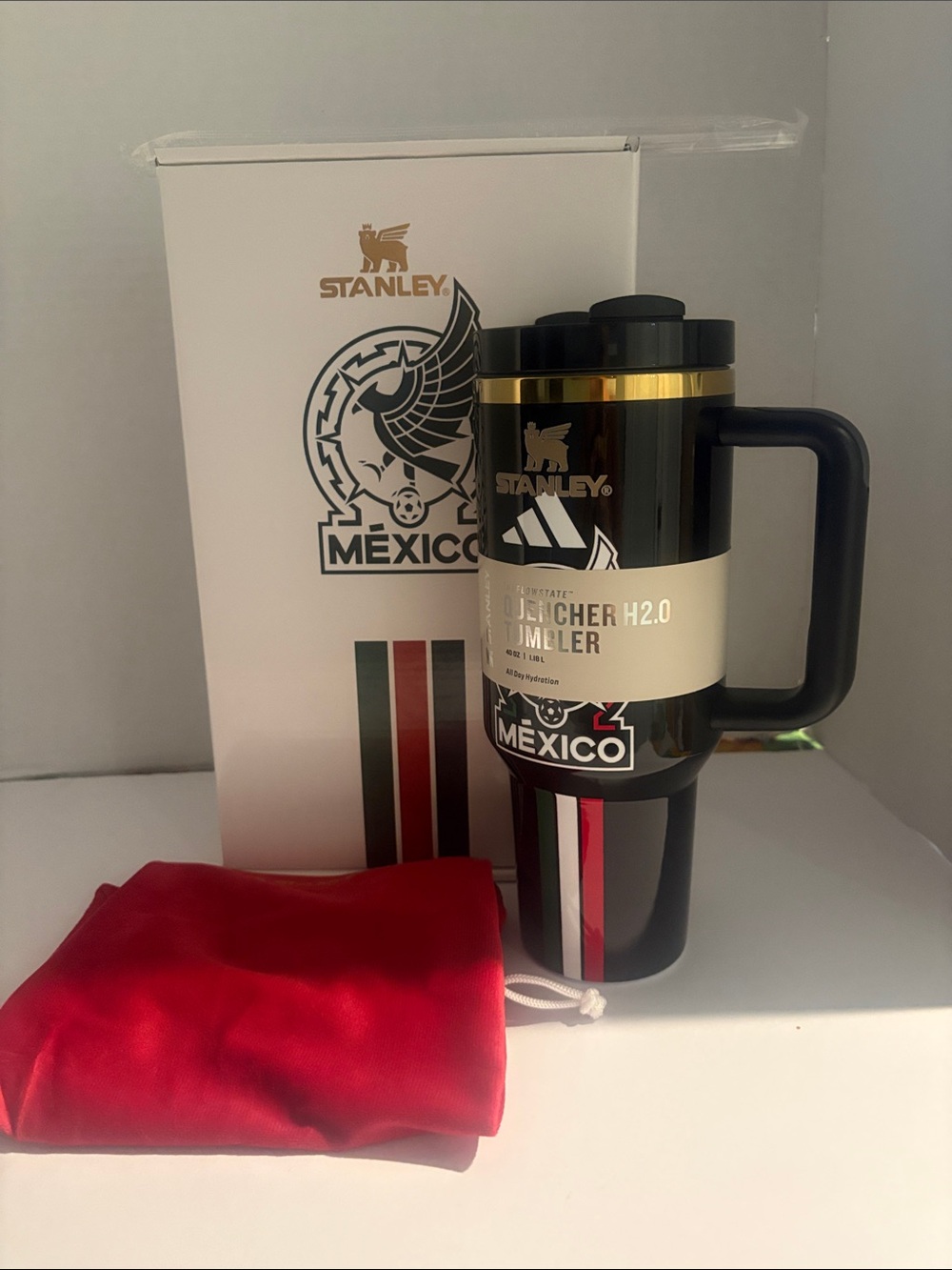 Stanley Black & Gold Mexico Quencher Travel Mug with Red Accent